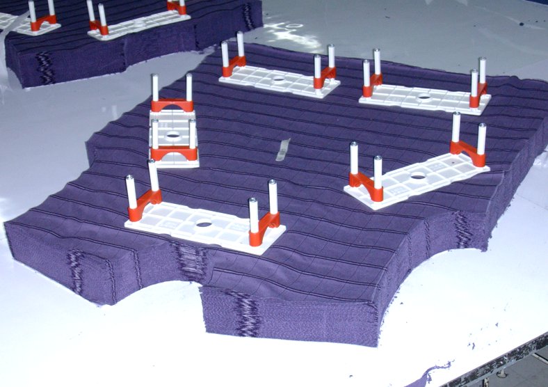 Pieces cut after spreading